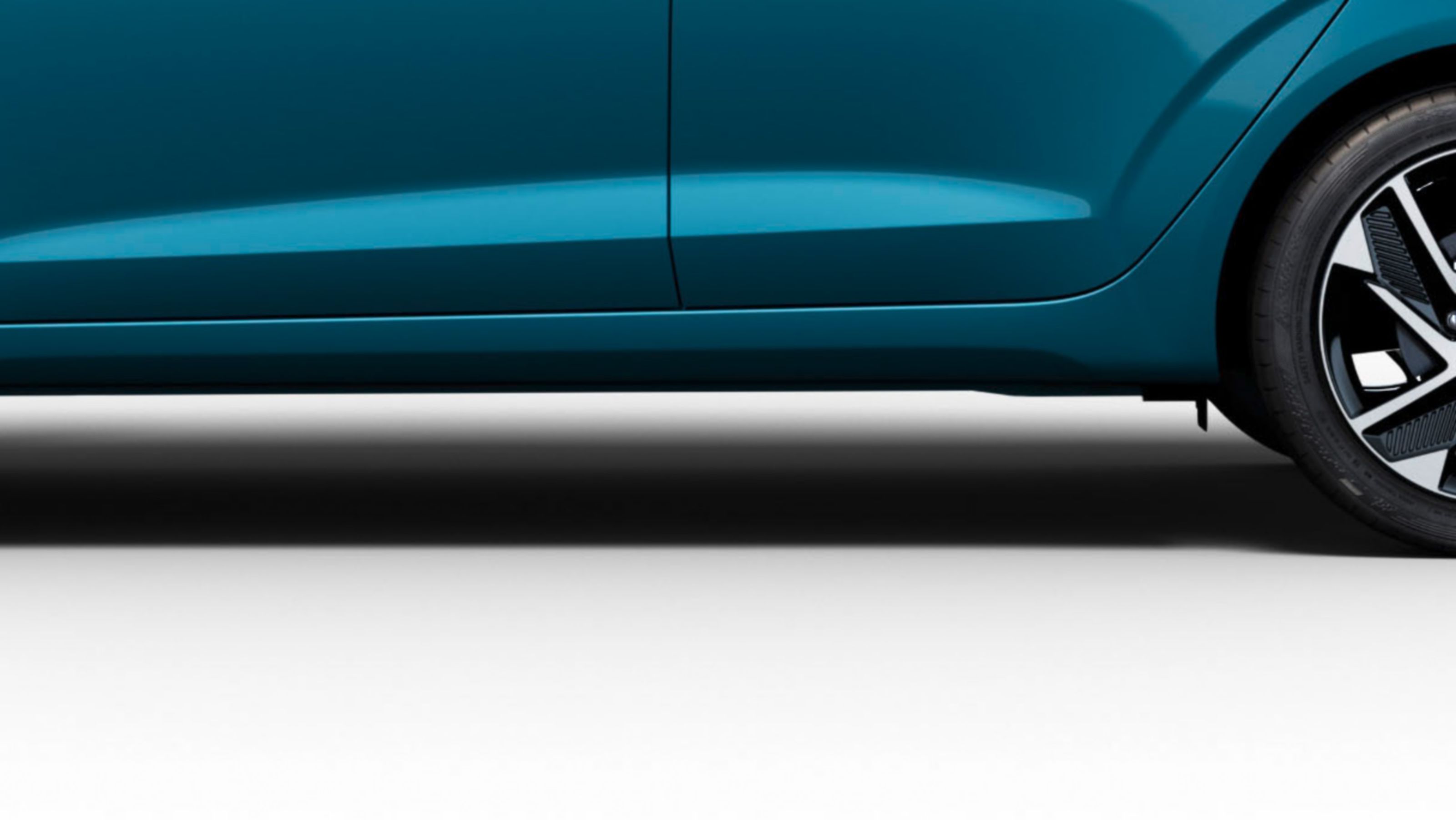 Hyundai i10's dynamic waist line in Aqua Turquoise Metallic.