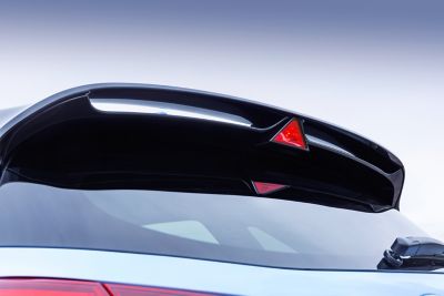 rear spoiler and triangular brake light of the new Hyundai i30 N performance hatchback.