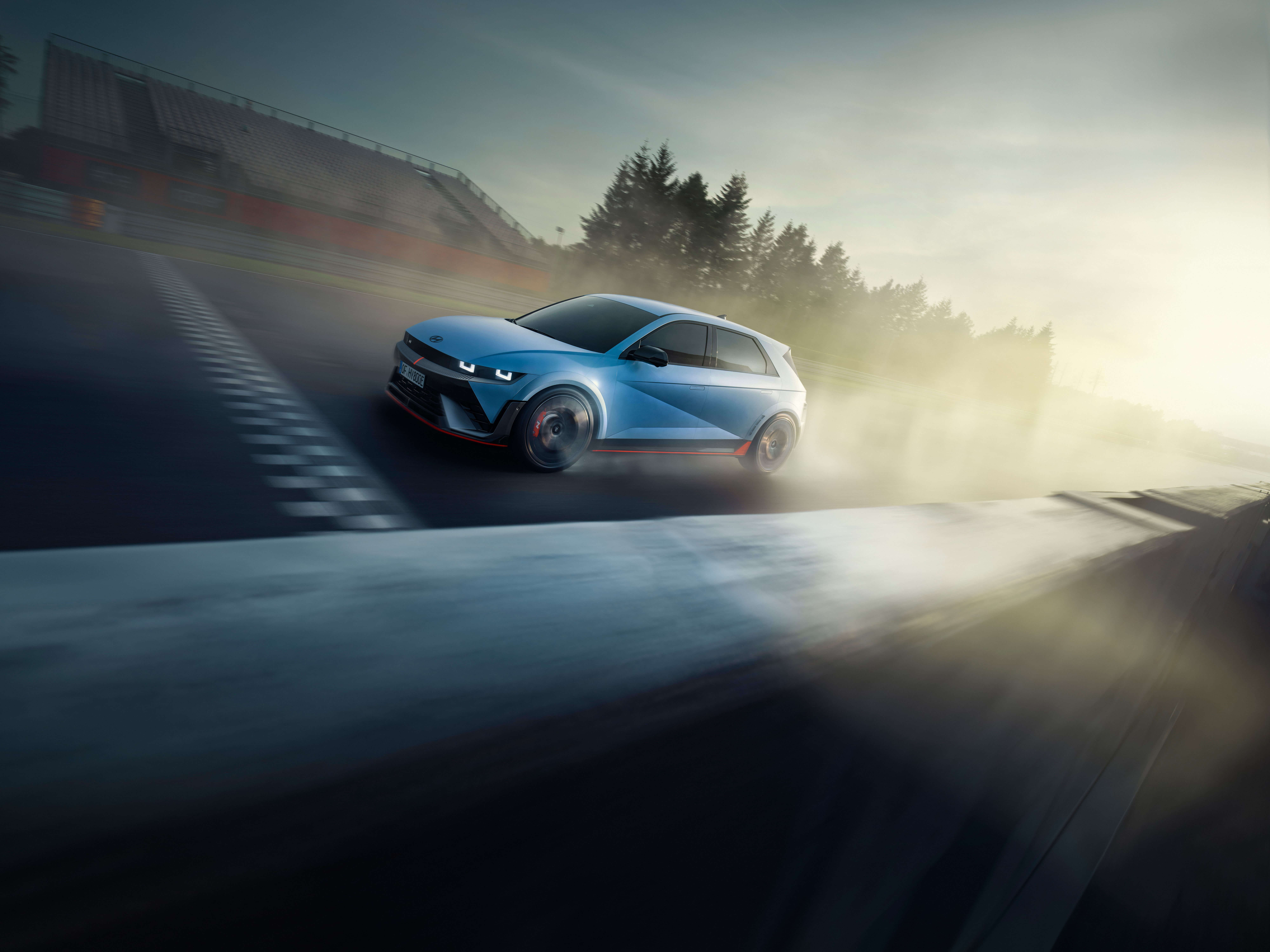 The all-electric Hyundai IONIQ 5 N driving on a racetrack.&nbsp;