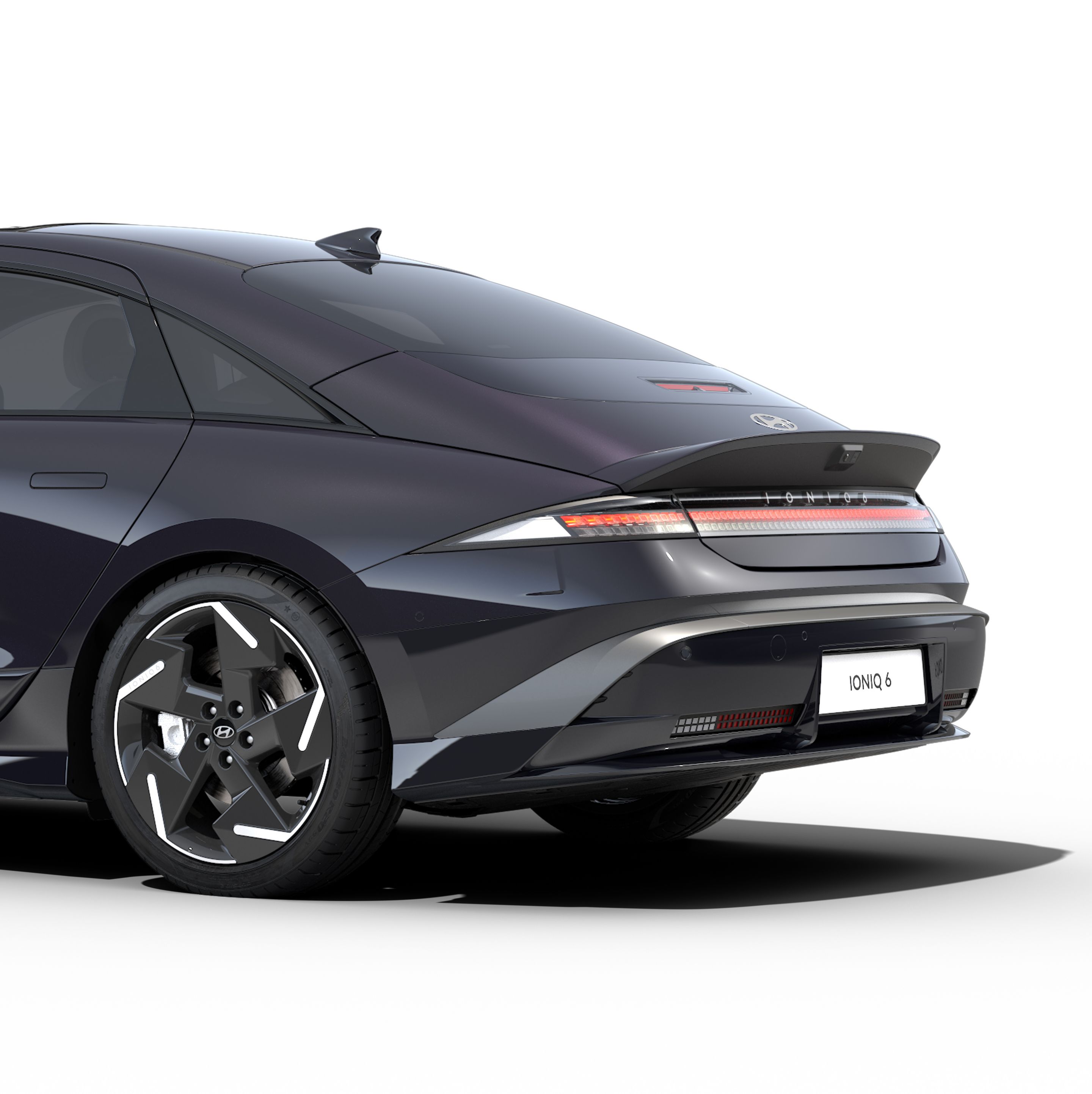 Hyundai IONIQ 6 electric sedan close up of rear 3/4 view.