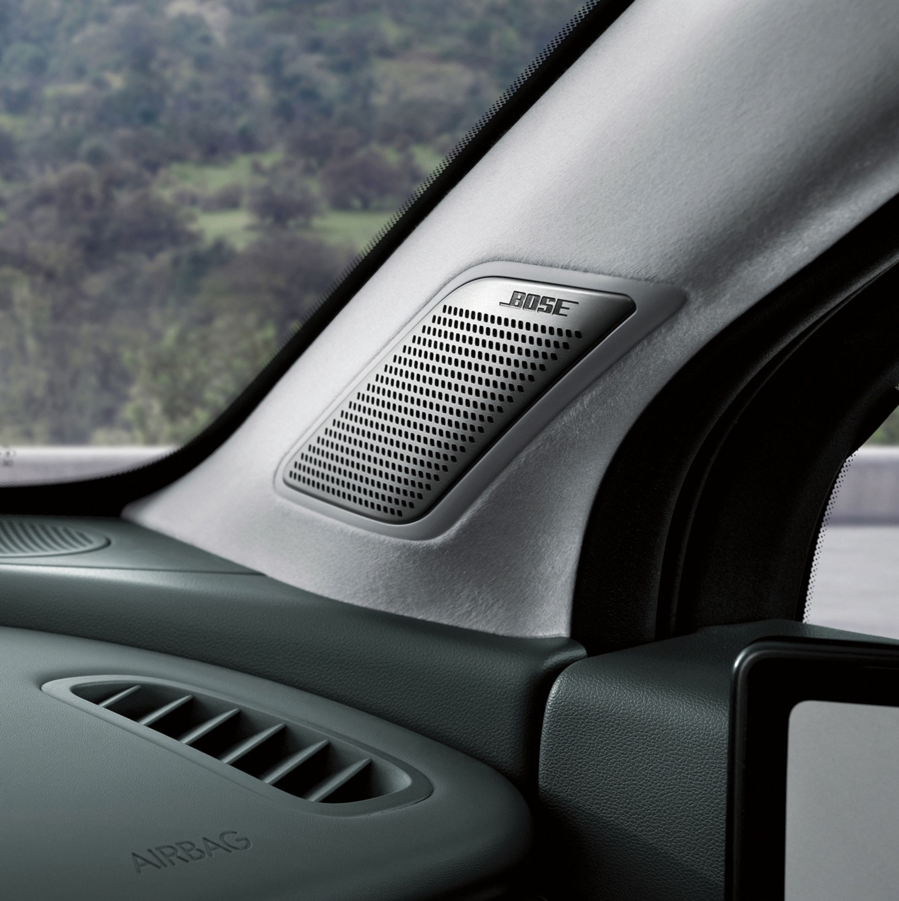 IONIQ 9 Active Noise Control-Road with a speaker of the BOSE® premium sound system.