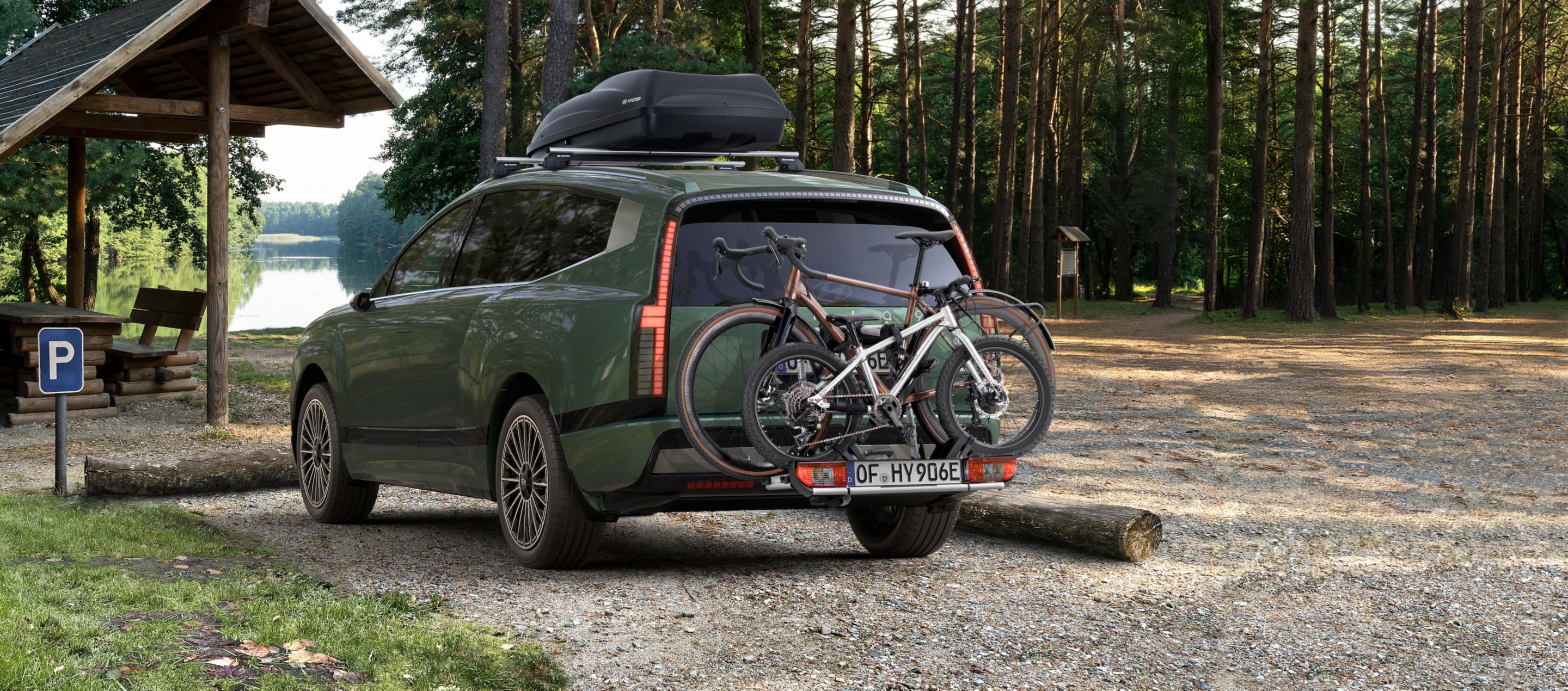 Hyundai IONIQ 9 with mounted Roof box and bike carrier for all tow bars transport accessories.