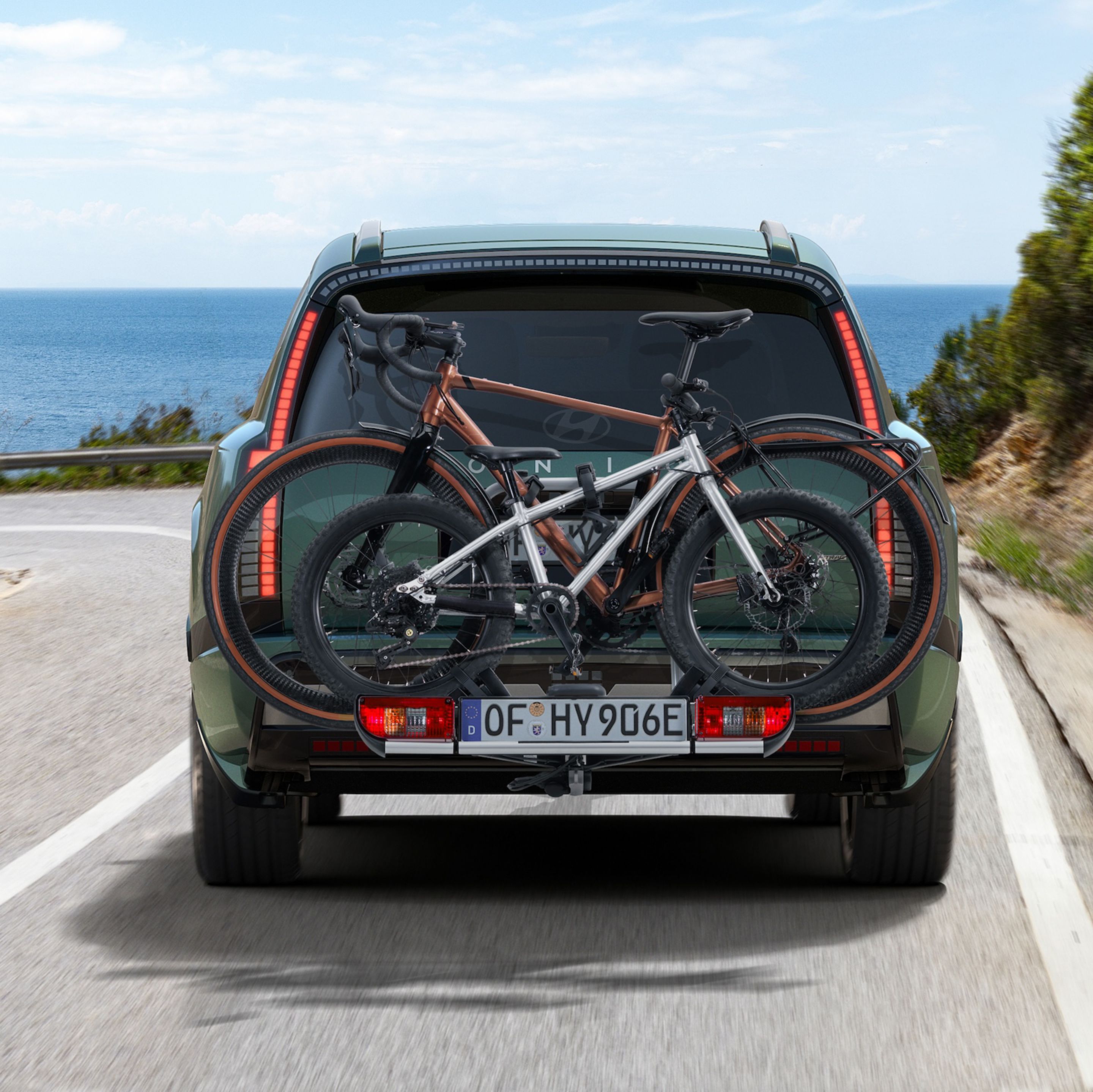 Hyundai IONIQ 9 with mounted bike carrier for all tow bars transport accessory.