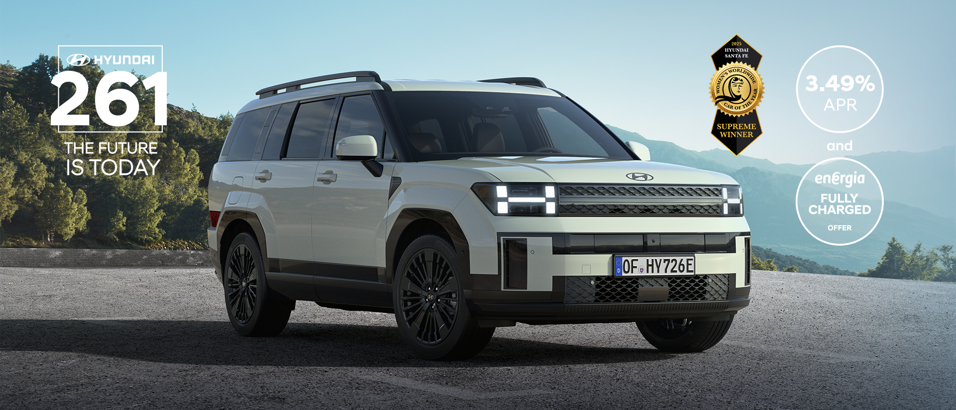 The Hyundai Santa Fe parked in an open garage.