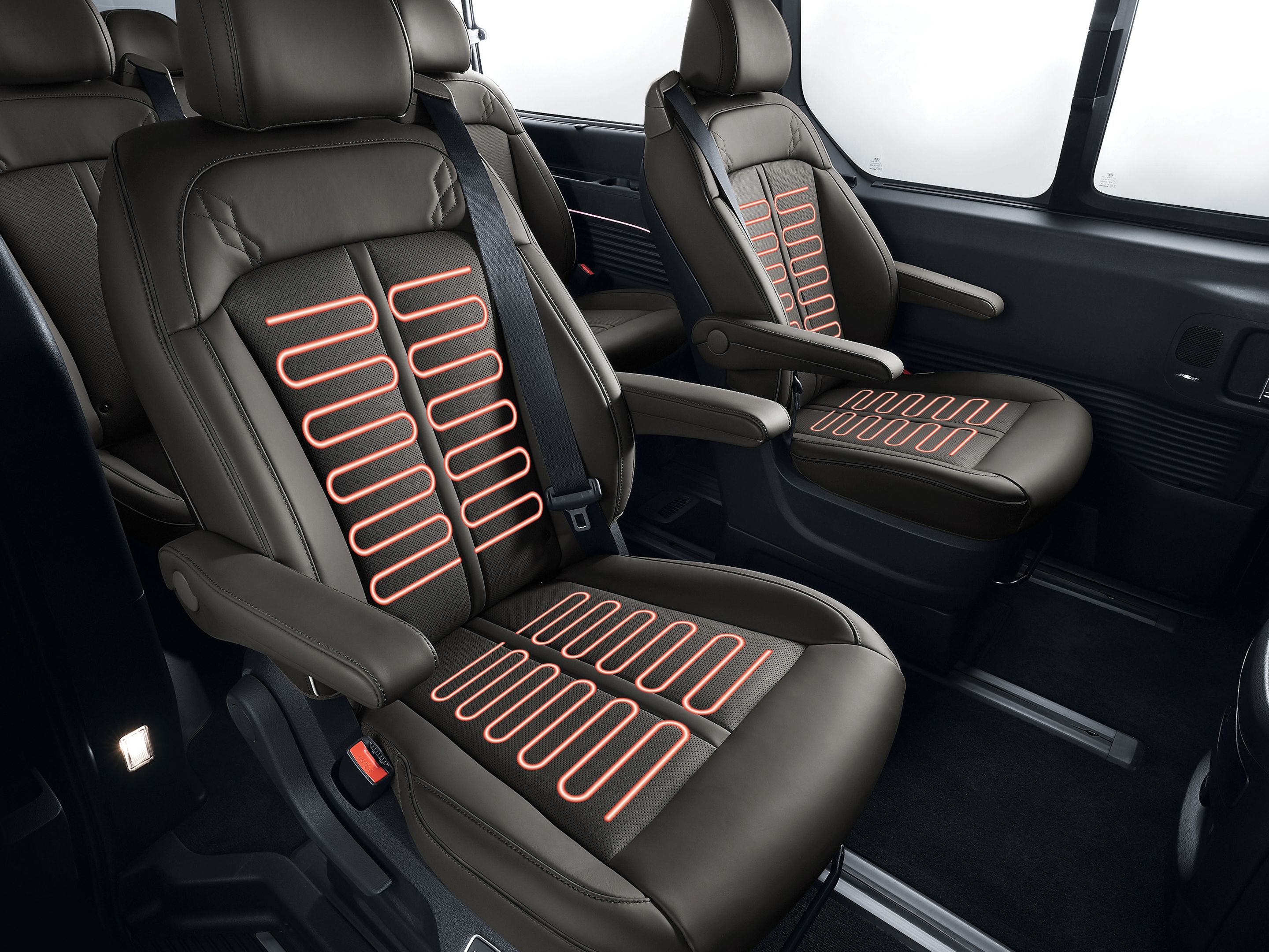 Hyundai STARIA Electric interior showcasing heated seats with integrated warming elements