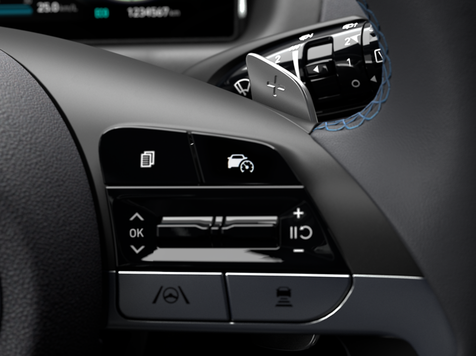 The paddle shifters on the steering wheel of the All-New Hyundai Tucson Hybrid compact SUV.