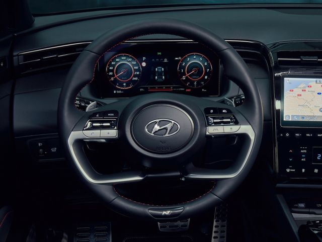 Detail of the all-new Hyundai TUCSON Plug in Hybrid N Line leather steering wheel